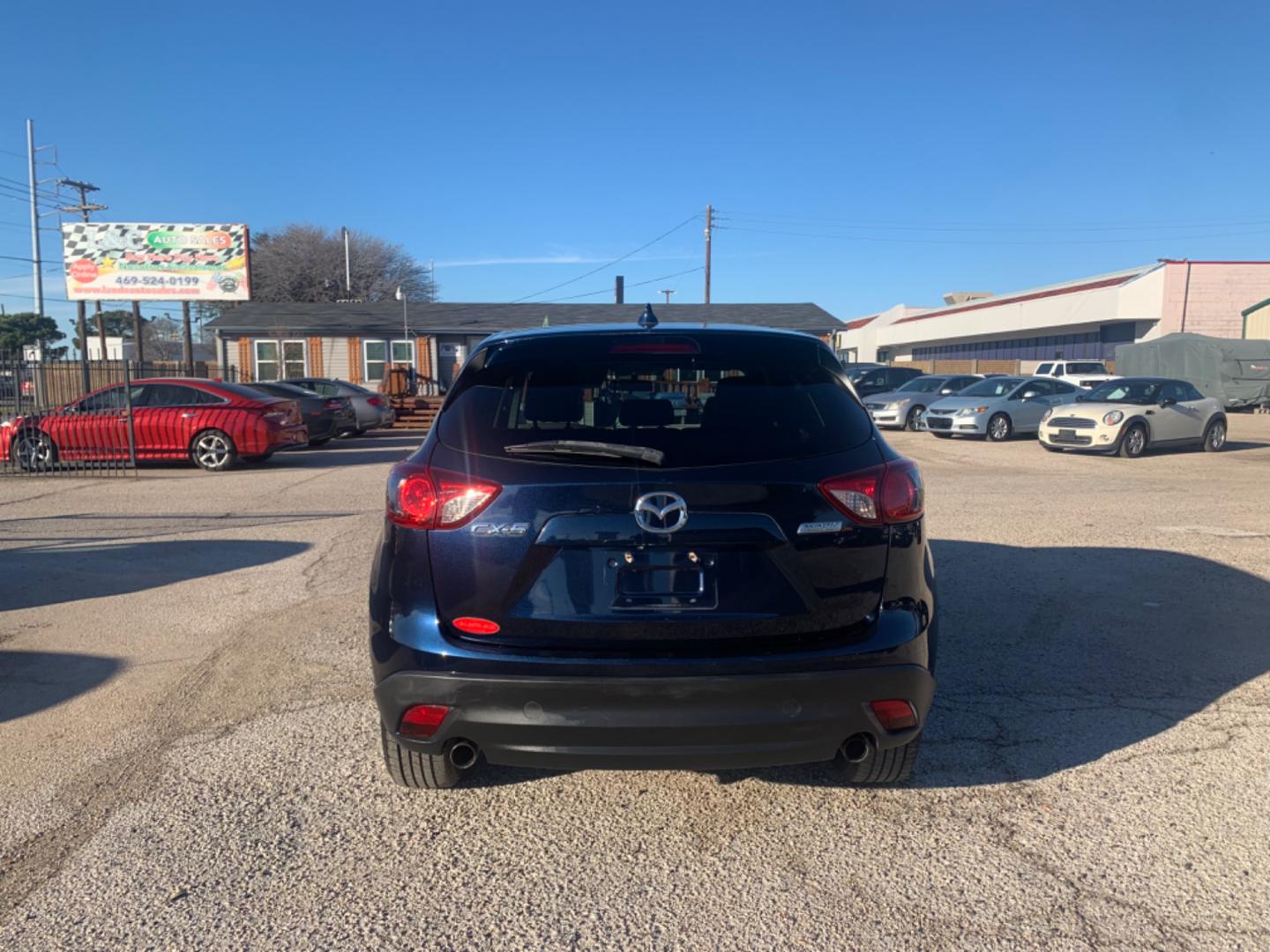 2014 Blue /Tan Mazda CX-5 Touring (JM3KE2CY1E0) with an 2.5L L4 DOHC 16V engine, Automatic transmission, located at 1830 North Belt Line Road, Irving, TX, 75061, (469) 524-0199, 32.834373, -96.993584 - Photo#3